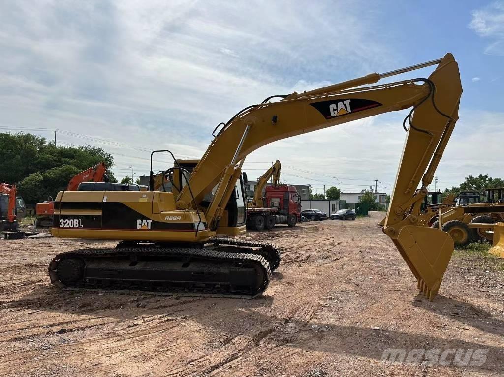 CAT 320 B L Гусеничні екскаватори