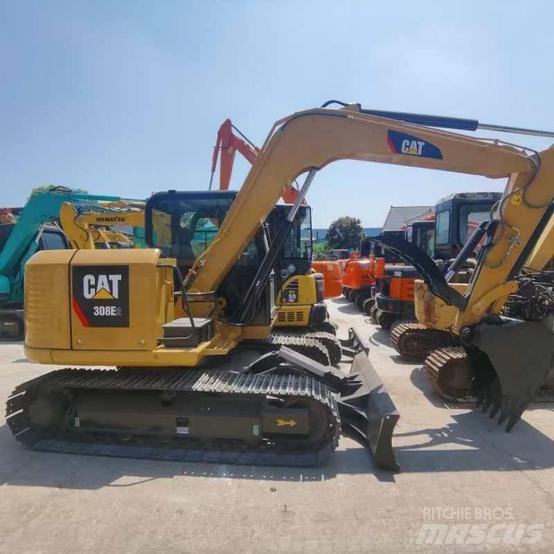 CAT 308 E Середні екскаватори 7т. - 12т.