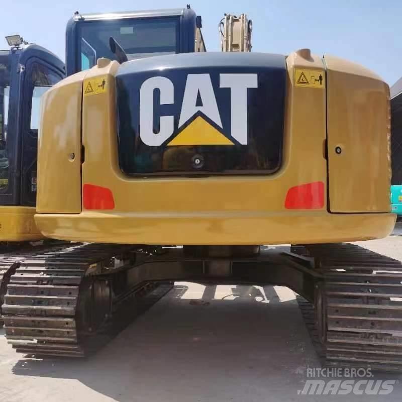 CAT 308 E Середні екскаватори 7т. - 12т.