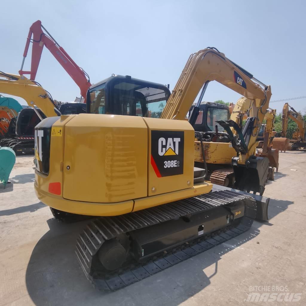CAT 308 E Середні екскаватори 7т. - 12т.