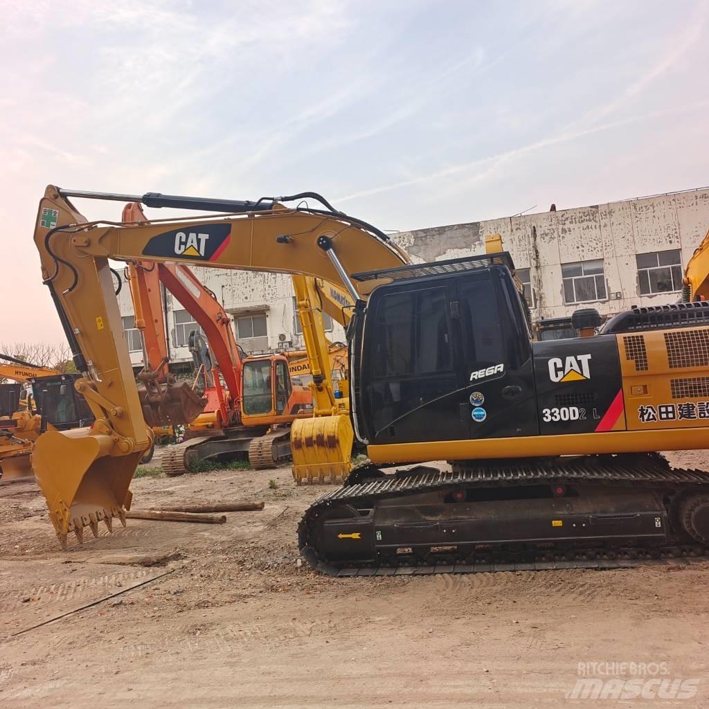 CAT 324D2L Гусеничні екскаватори