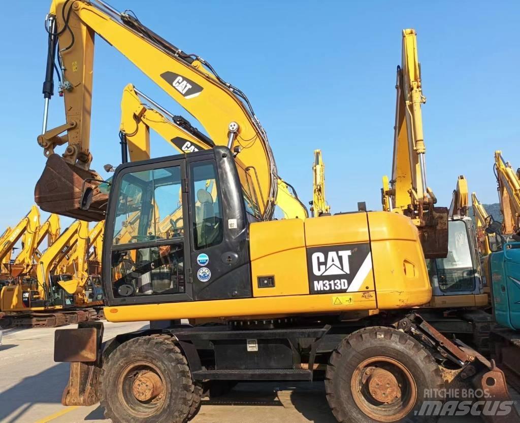 CAT CAT313D Середні екскаватори 7т. - 12т.