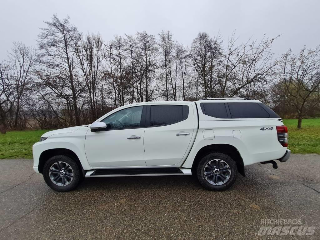 Mitsubishi L200 Пікапи / Бічне розвантаження