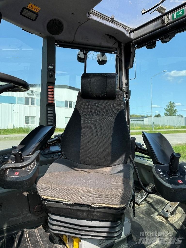 Huddig 1260 C Екскаватори-навантажувачі