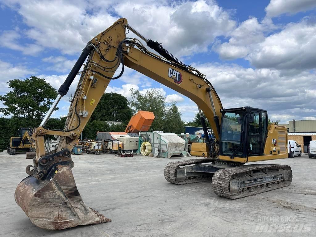 CAT 323 Гусеничні екскаватори