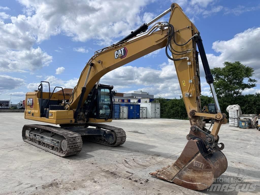 CAT 323 Гусеничні екскаватори