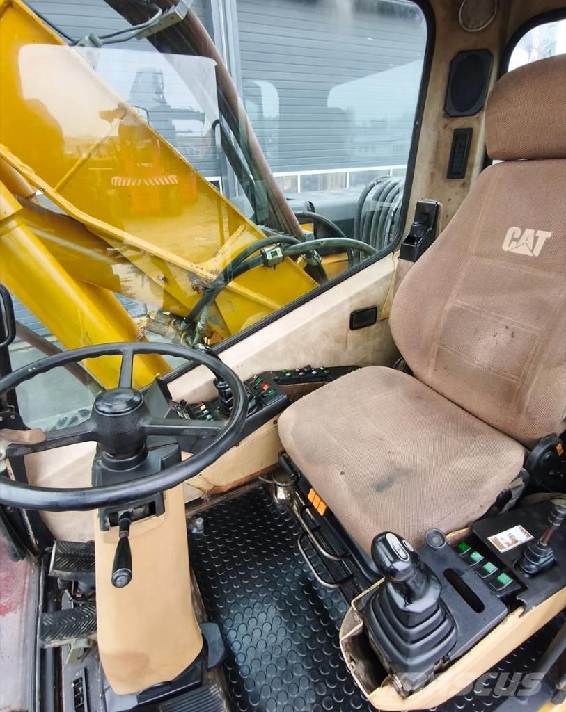 CAT M 315 Колісні екскаватори