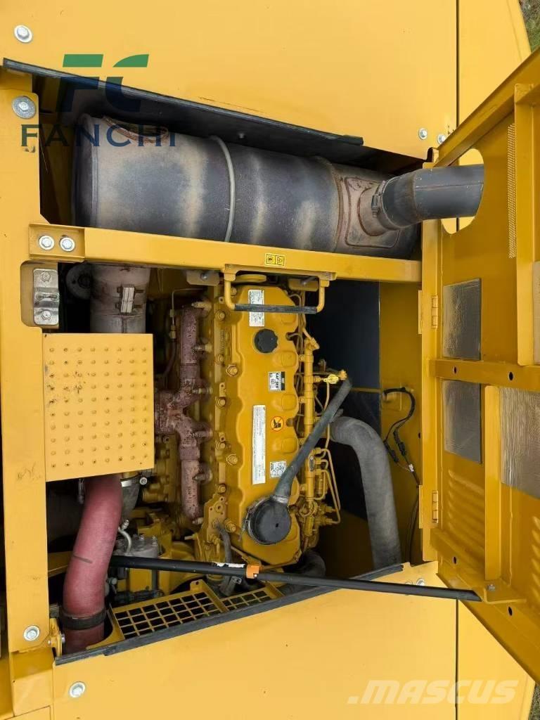 CAT 345 Гусеничні екскаватори