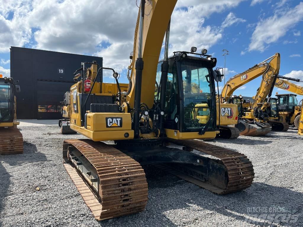CAT 320 Гусеничні екскаватори