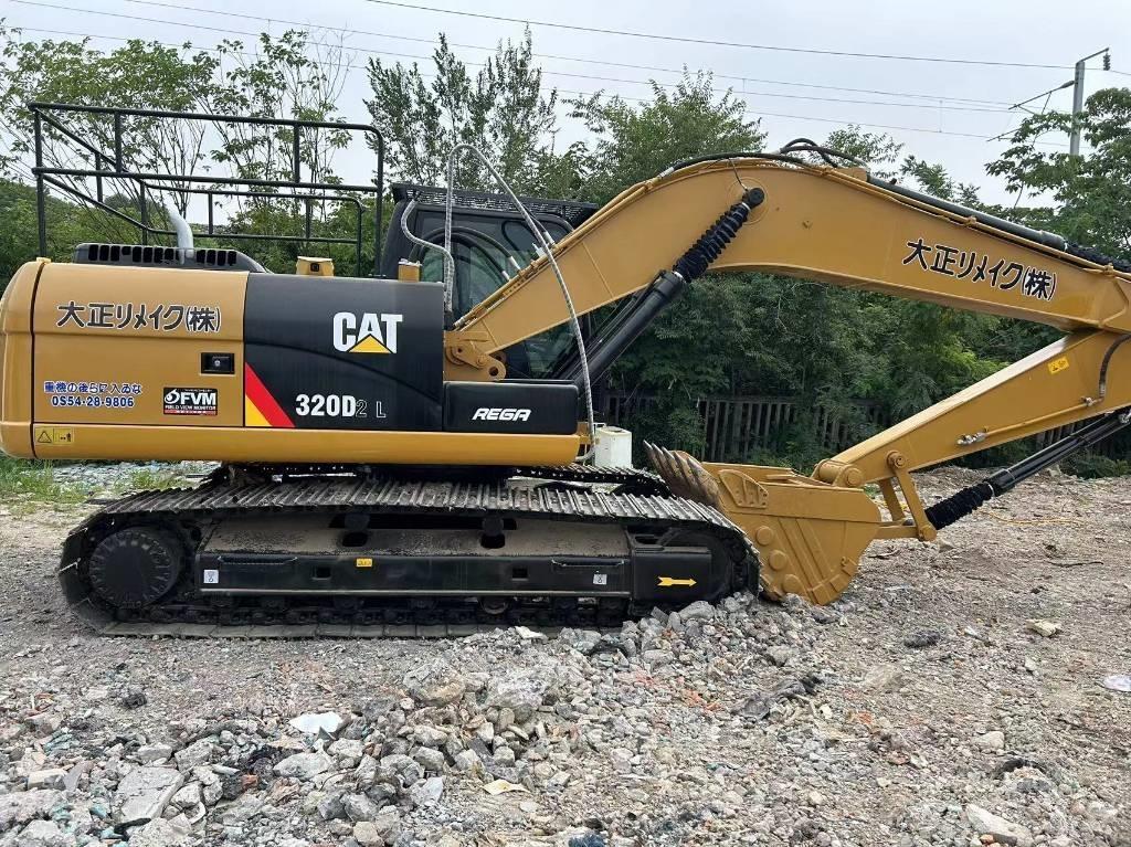 CAT 320 D2L Середні екскаватори 7т. - 12т.