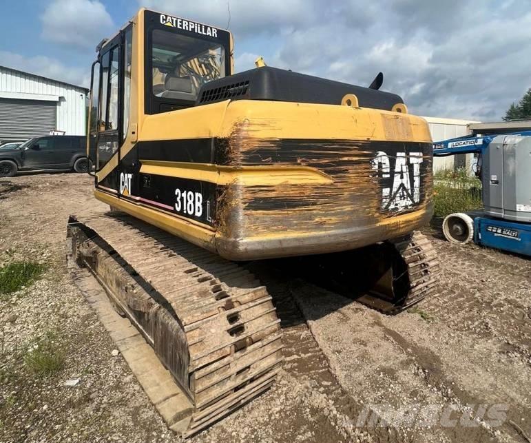 CAT 318 B Гусеничні екскаватори