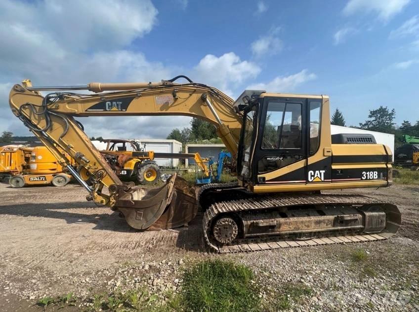 CAT 318 B Гусеничні екскаватори