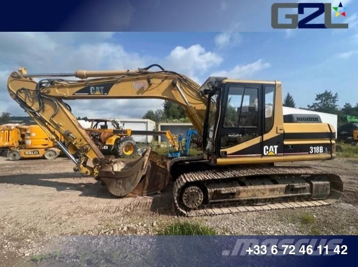 CAT 318 B Гусеничні екскаватори