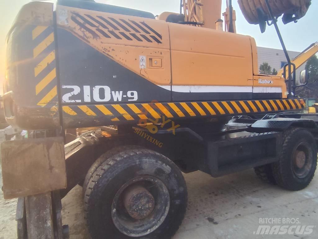 Hyundai 210W-9 Колісні екскаватори