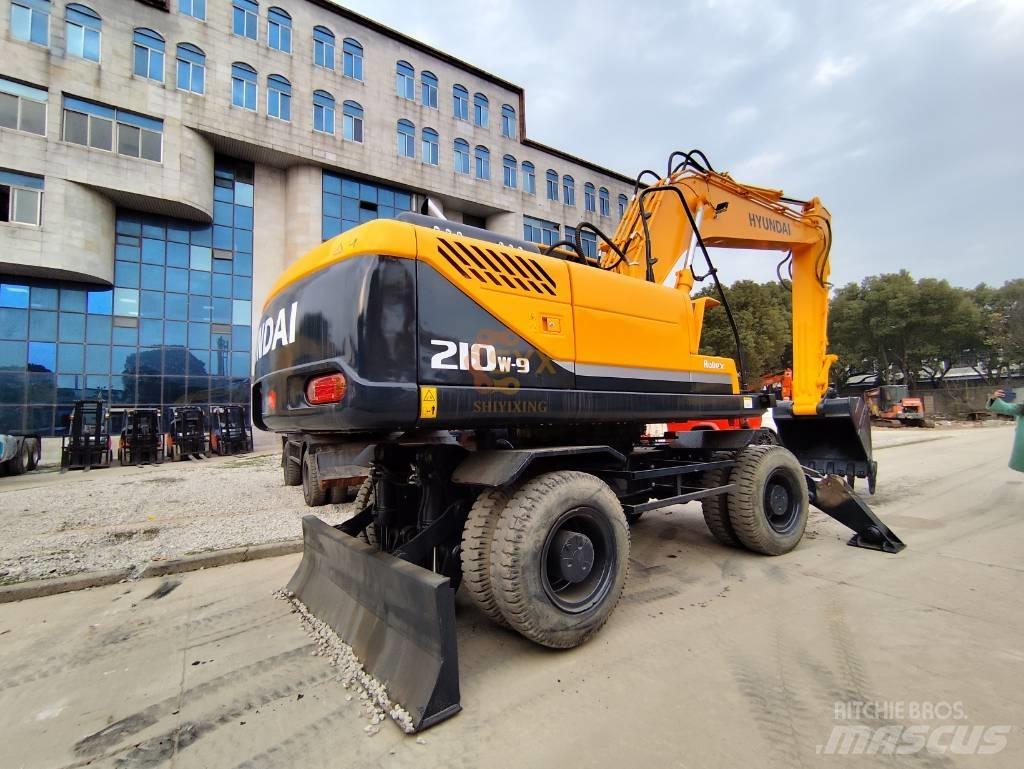 Hyundai 210W-9 Колісні екскаватори