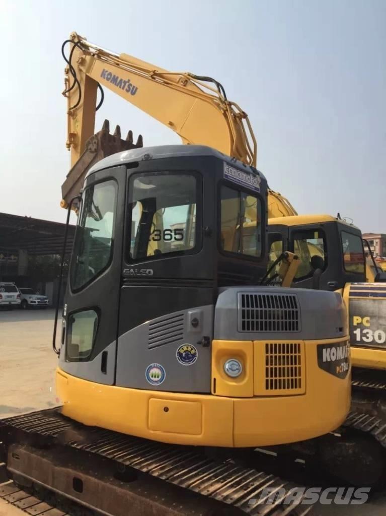 Komatsu pc78us Середні екскаватори 7т. - 12т.