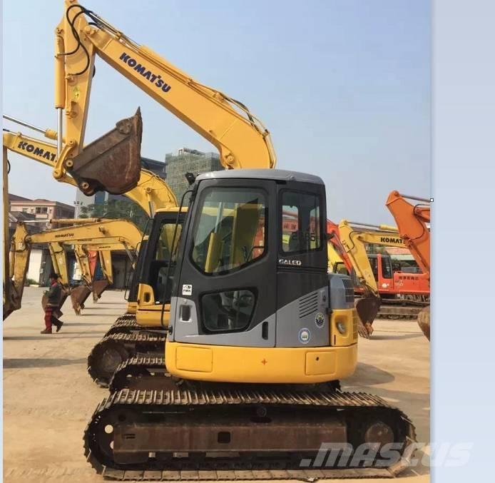 Komatsu pc78us Середні екскаватори 7т. - 12т.