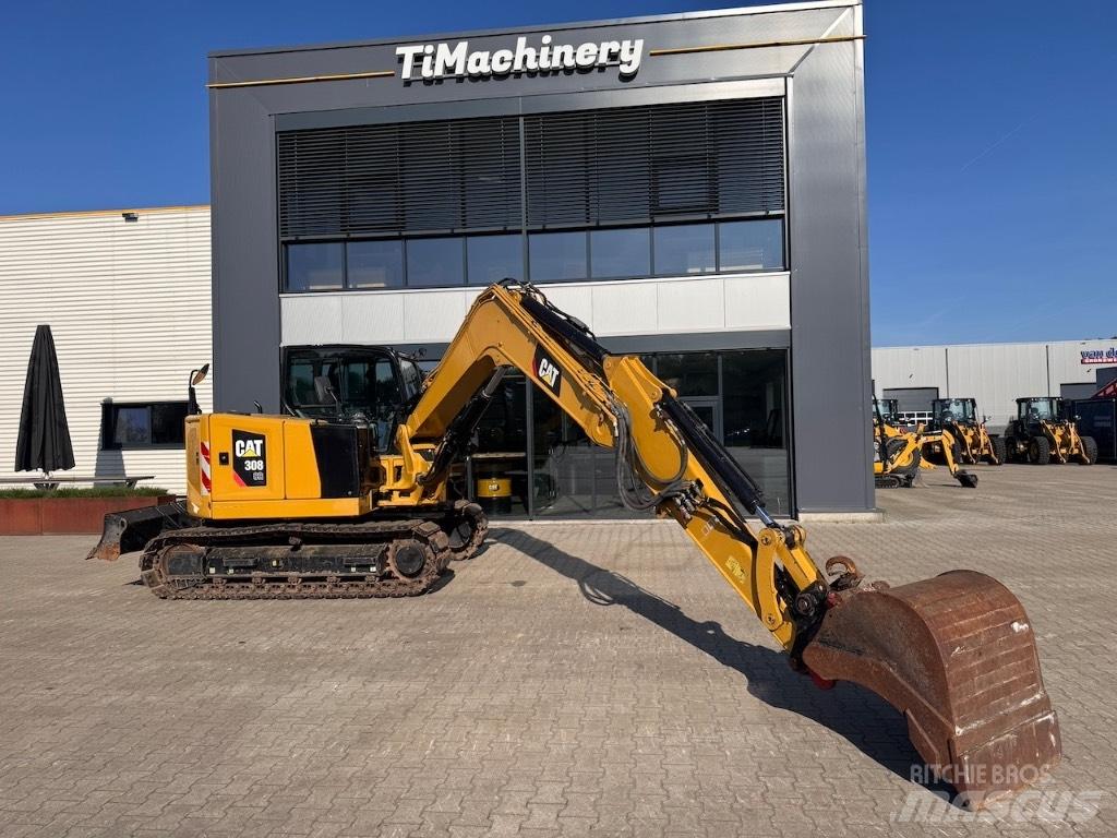 CAT 308 CR Середні екскаватори 7т. - 12т.