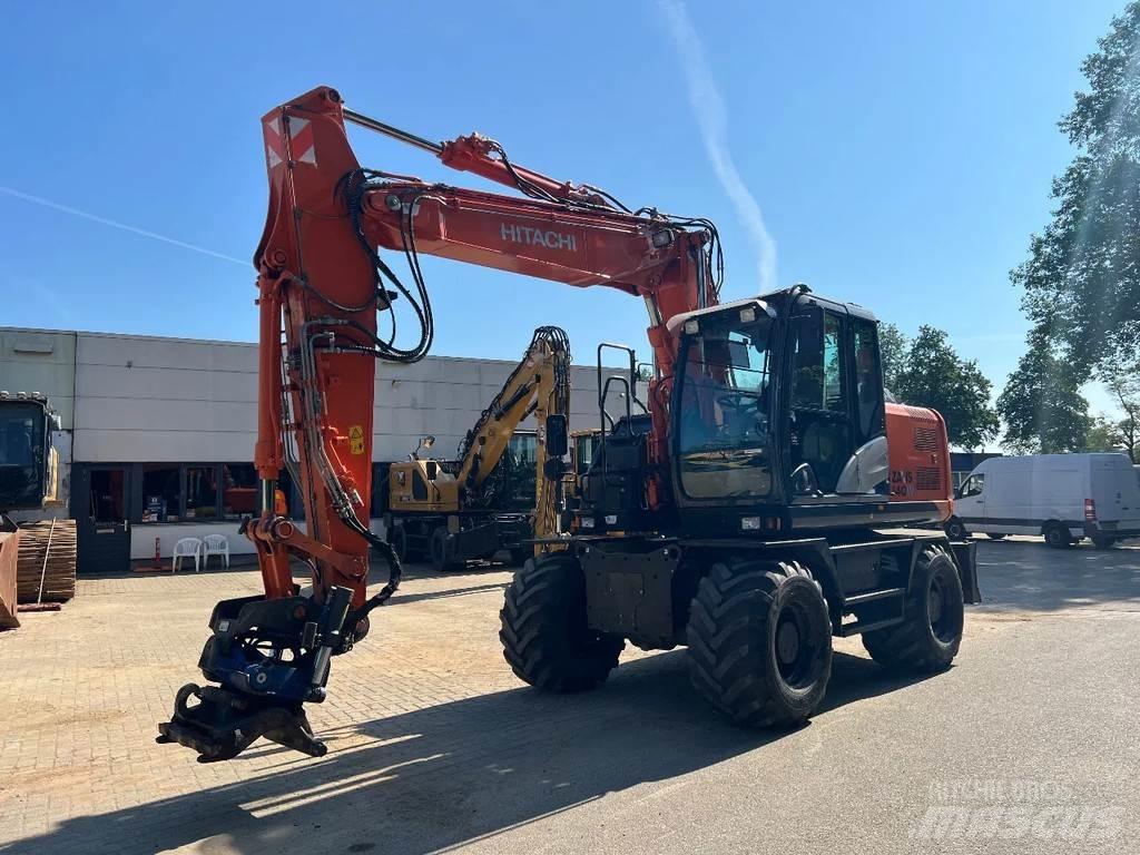 Hitachi 140W Колісні екскаватори
