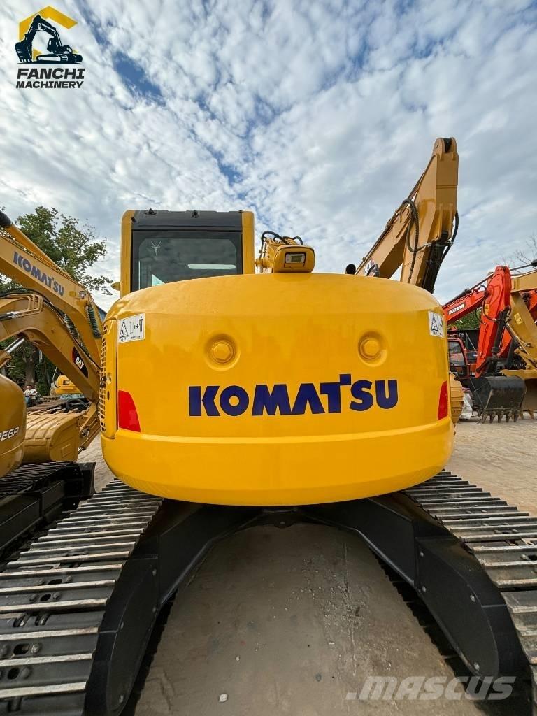 Komatsu PC 128 US Гусеничні екскаватори