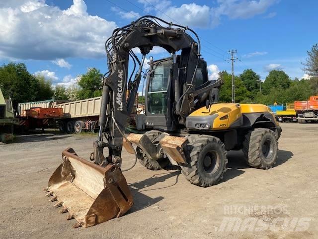 Mecalac 12 MTX Колісні екскаватори