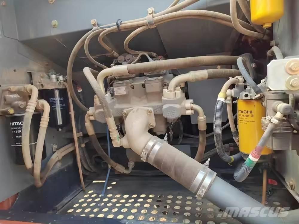 Hitachi ZX 200 Гусеничні екскаватори
