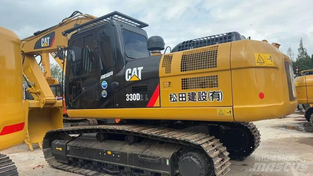 CAT CAT330D2L Середні екскаватори 7т. - 12т.