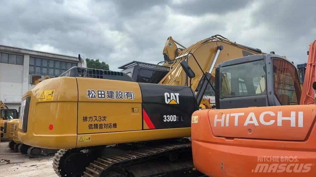 CAT CAT330D2L Середні екскаватори 7т. - 12т.