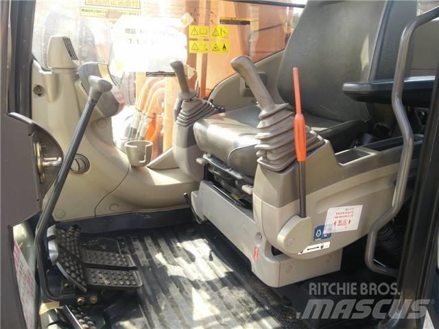 Hitachi ZX 200 Гусеничні екскаватори