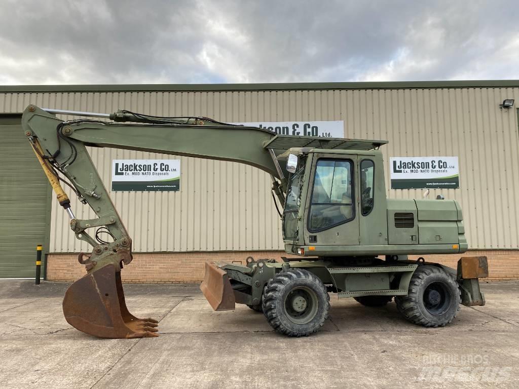 CAT 315M Колісні екскаватори