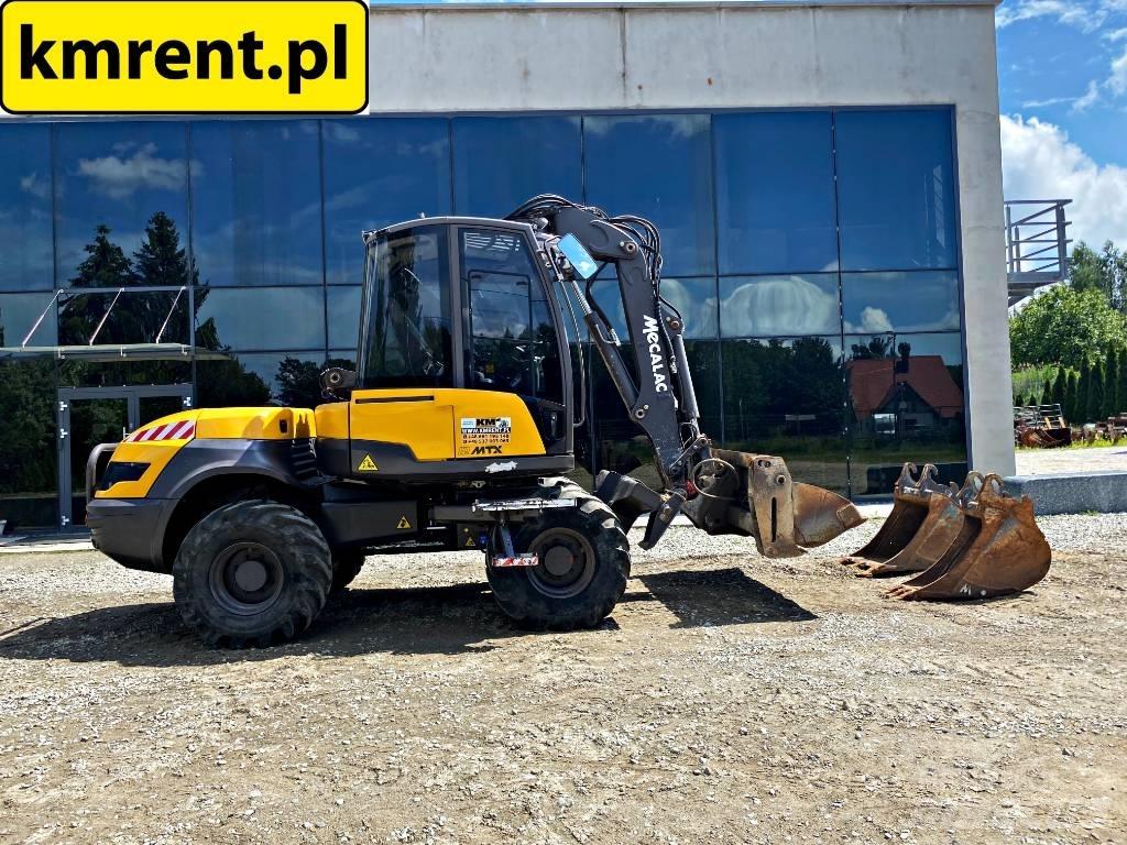 Mecalac 12 M TX Екскаватори-навантажувачі