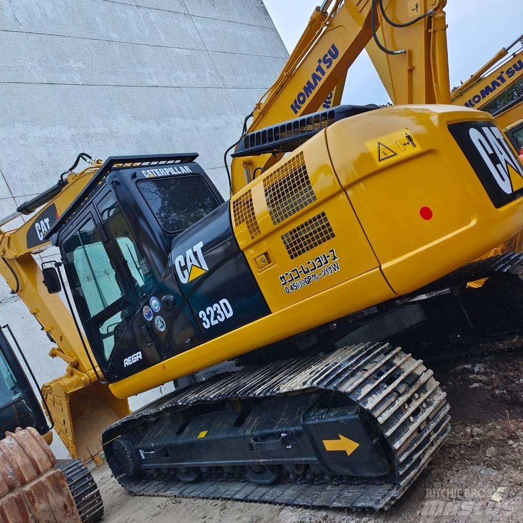 CAT 323 D Гусеничні екскаватори