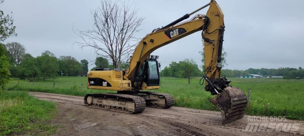 CAT 320 Гусеничні екскаватори
