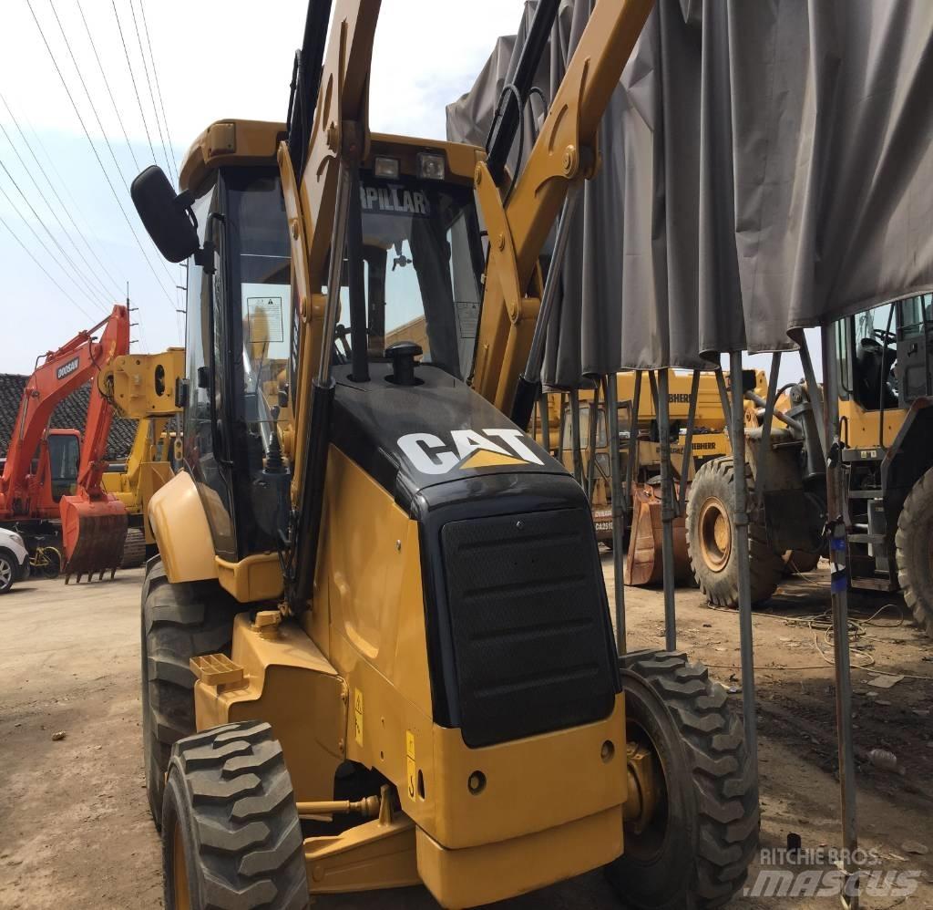 CAT 416 E Екскаватори-навантажувачі