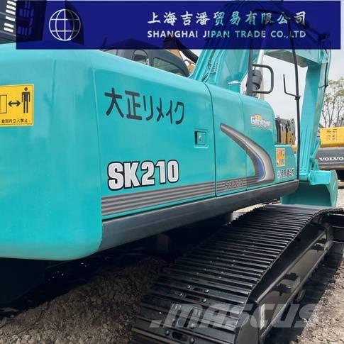 Kobelco SK 210 Гусеничні екскаватори