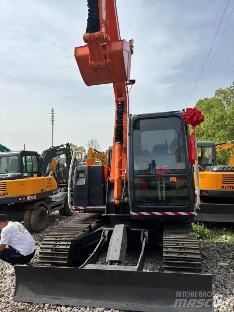 Hitachi ZX 70 Гусеничні екскаватори