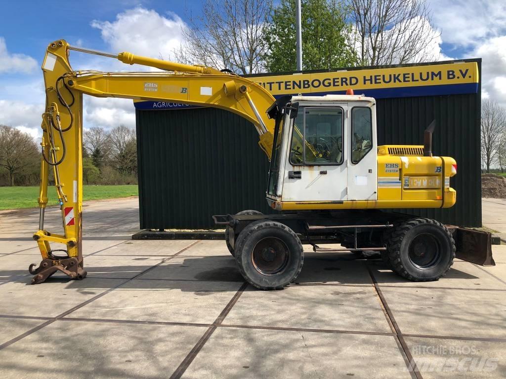 Etec 813B Колісні екскаватори