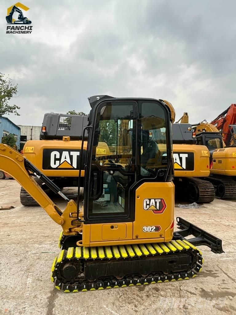CAT 302 Міні-екскаватори < 7т