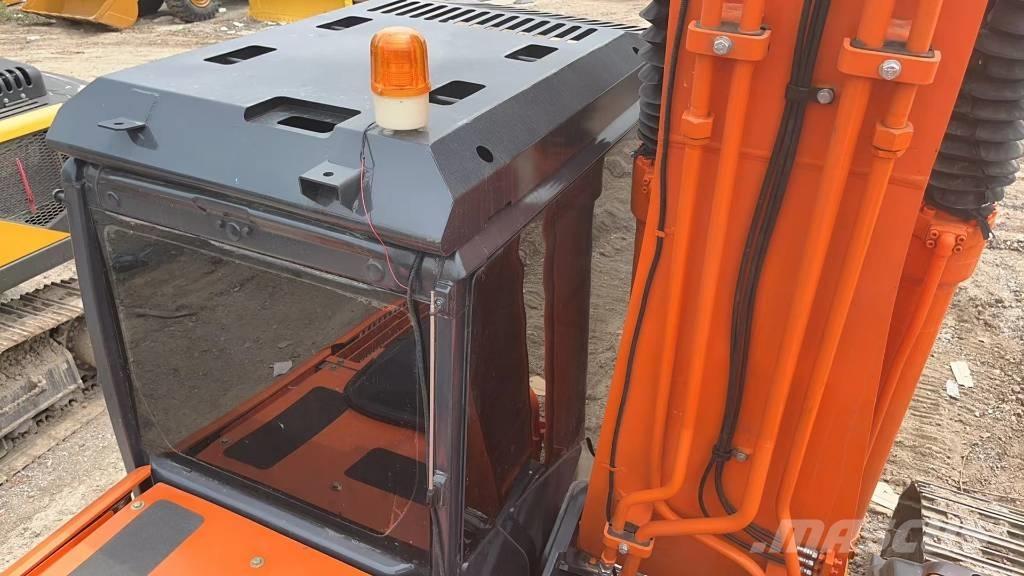 Hitachi ZX 70 Міні-екскаватори < 7т