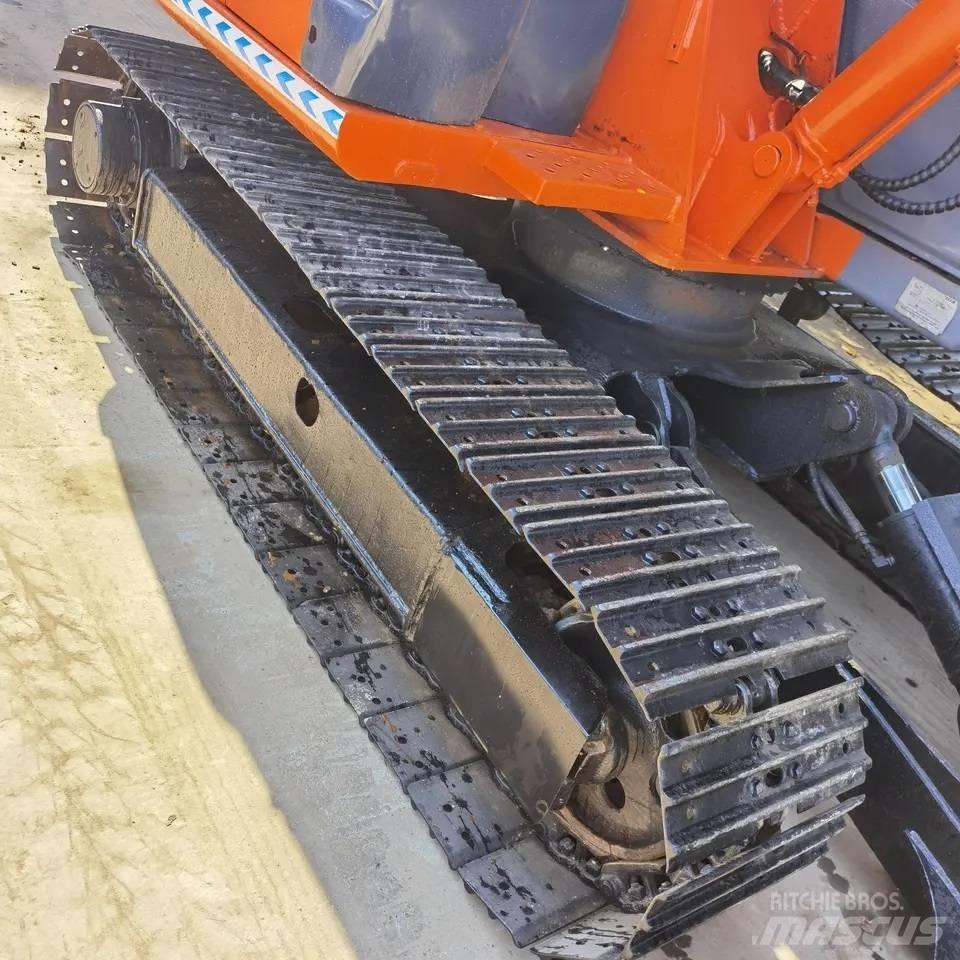 Hitachi ZX70 Гусеничні екскаватори