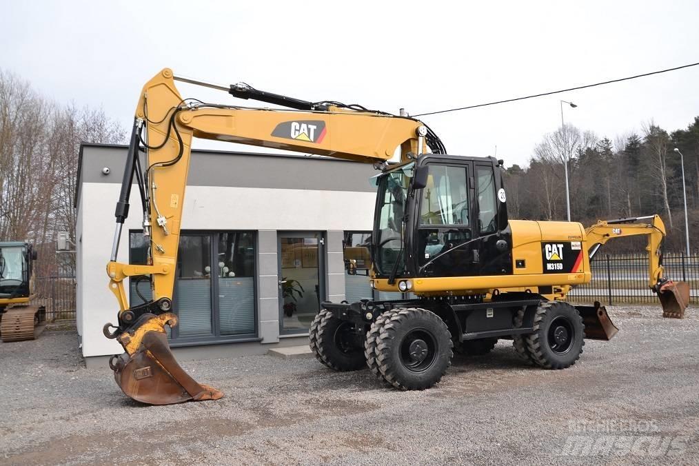 CAT M 315 D Колісні екскаватори