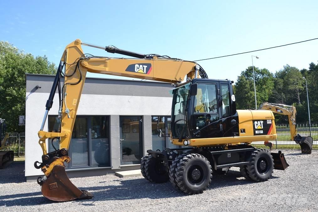 CAT M 315 D Колісні екскаватори