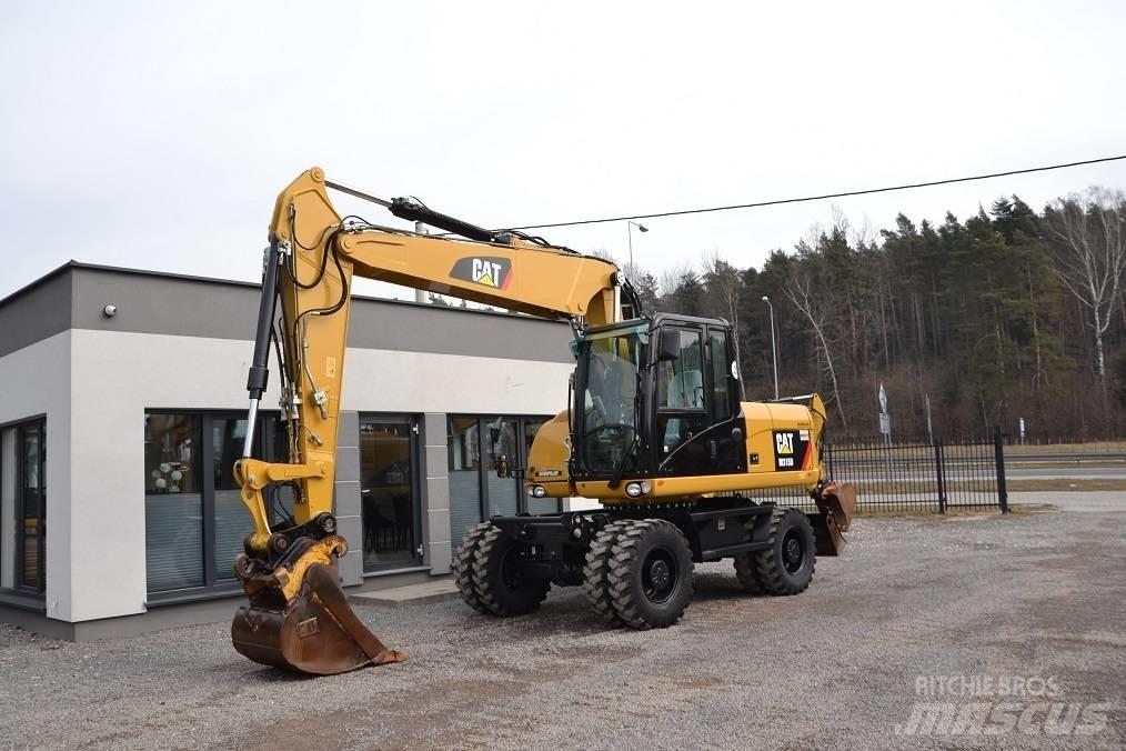 CAT M 315 D Колісні екскаватори