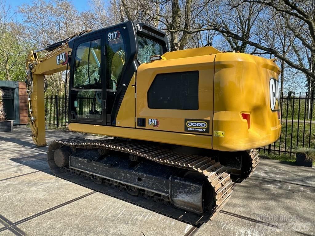 CAT 317 Гусеничні екскаватори