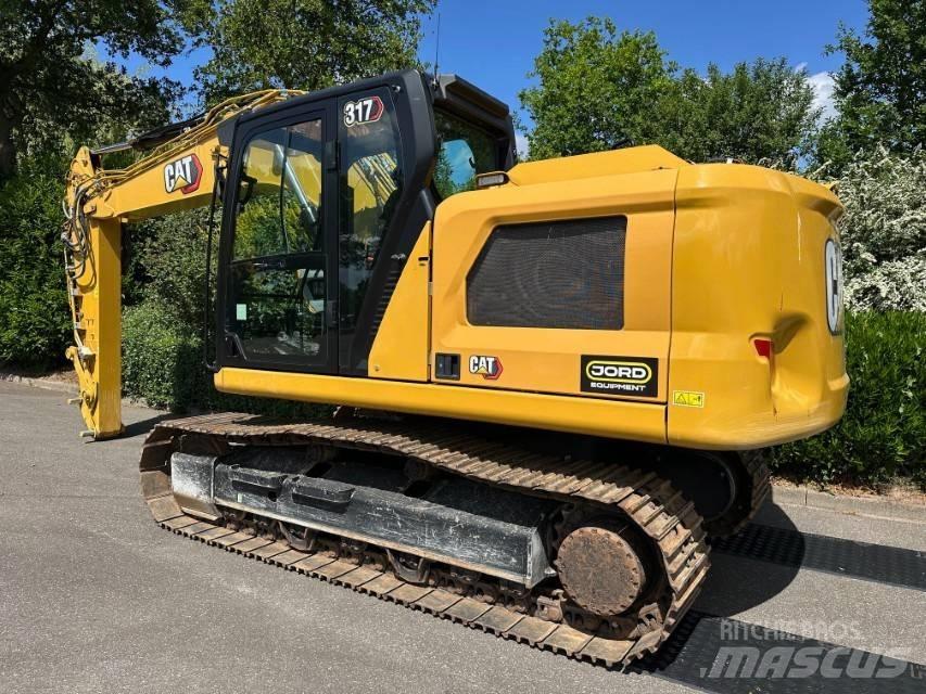 CAT 317 Гусеничні екскаватори