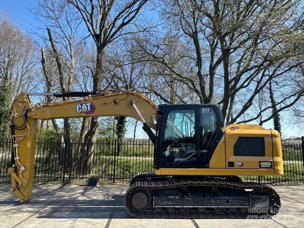 CAT 317 Гусеничні екскаватори
