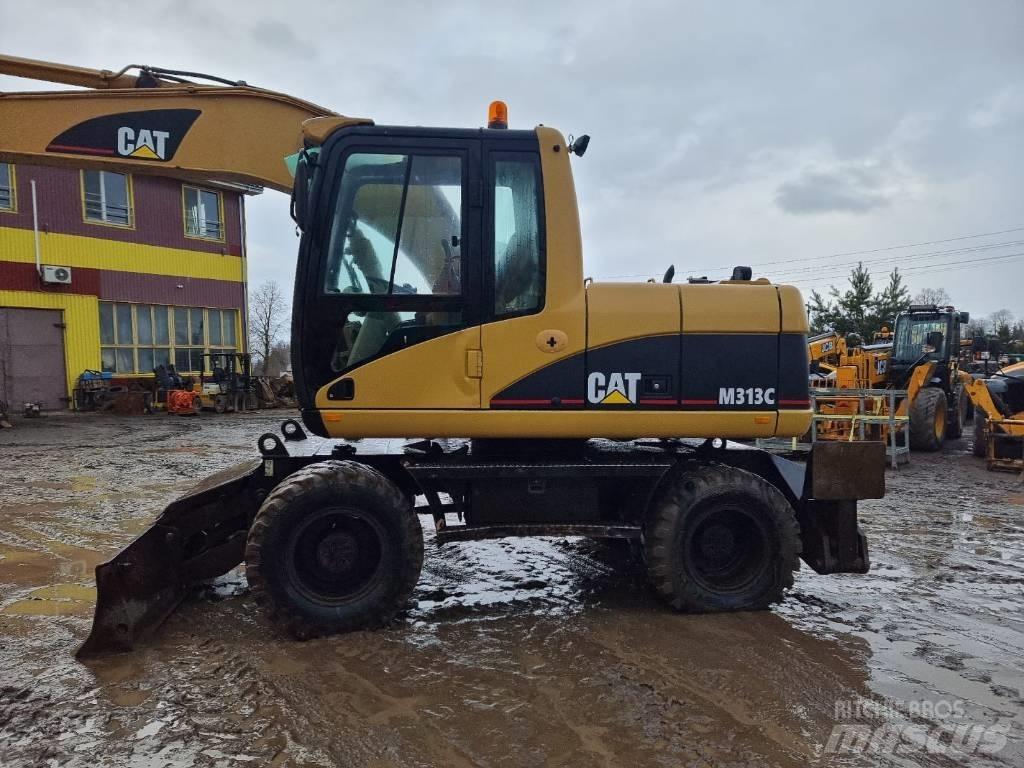 CAT M 313 C Колісні екскаватори