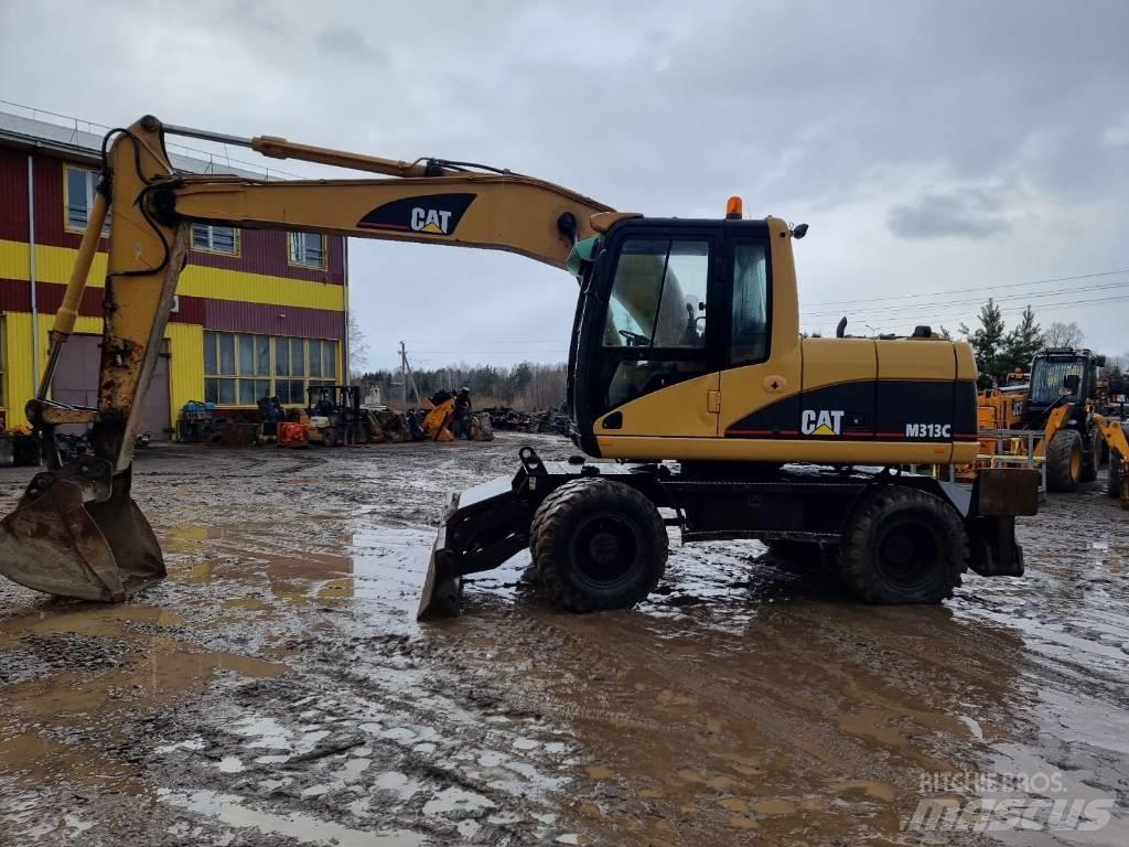 CAT M 313 C Колісні екскаватори