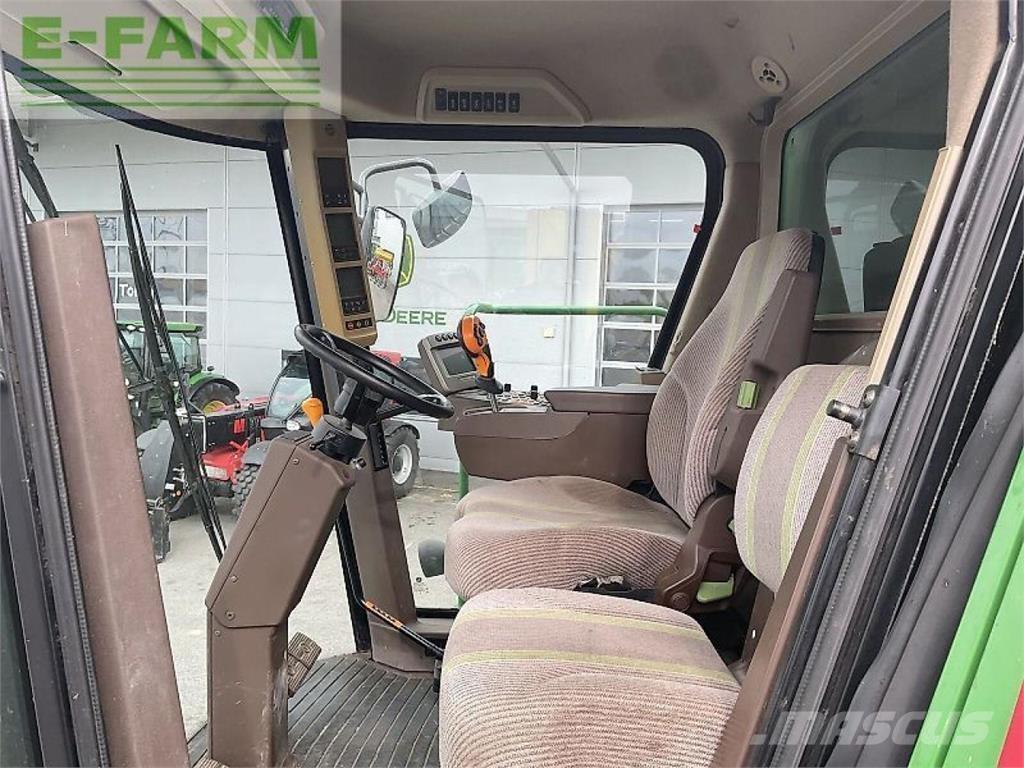 John Deere t560hm Зернозбиральні комбайни