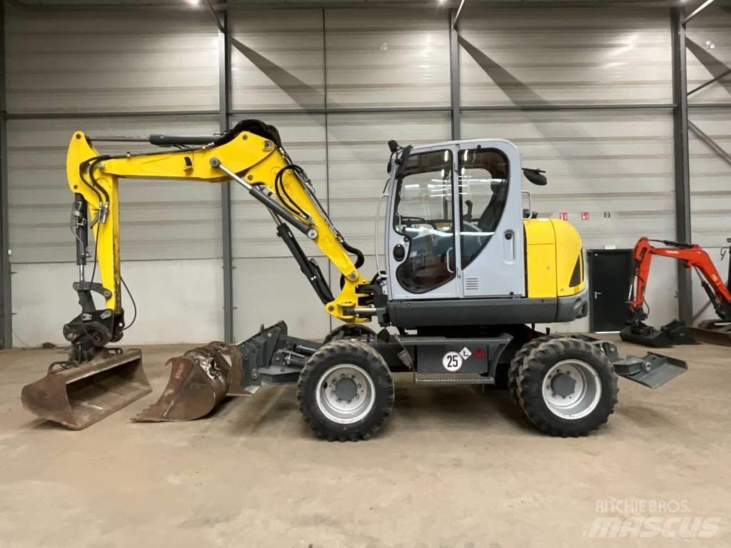 Neuson EW 100 Колісні екскаватори